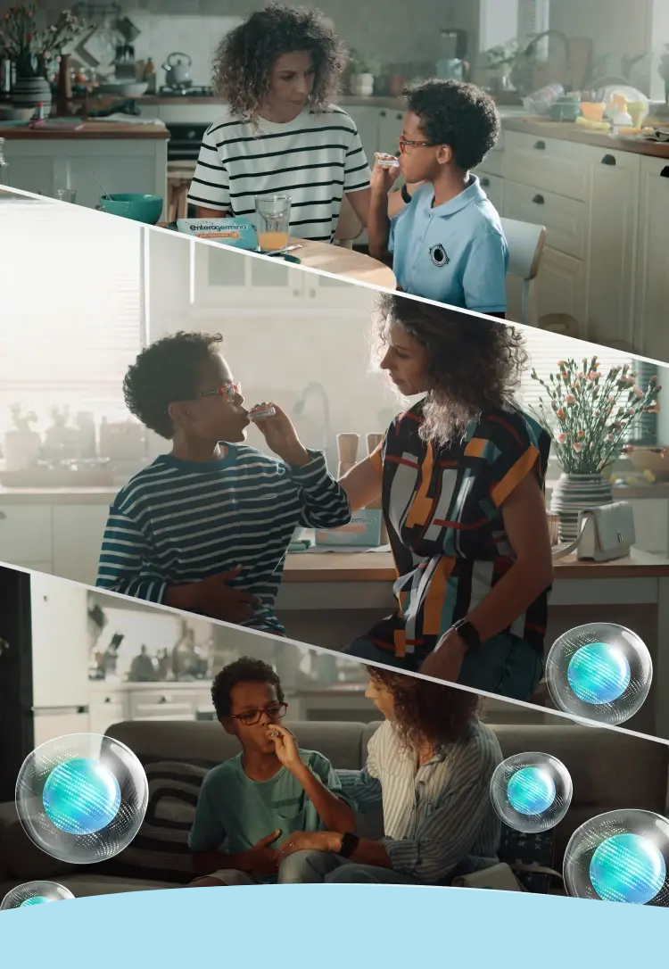 Mãe e filho em uma cozinha tomando Enterogermina suspensão oral.